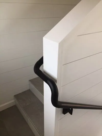 Interior corner handrail